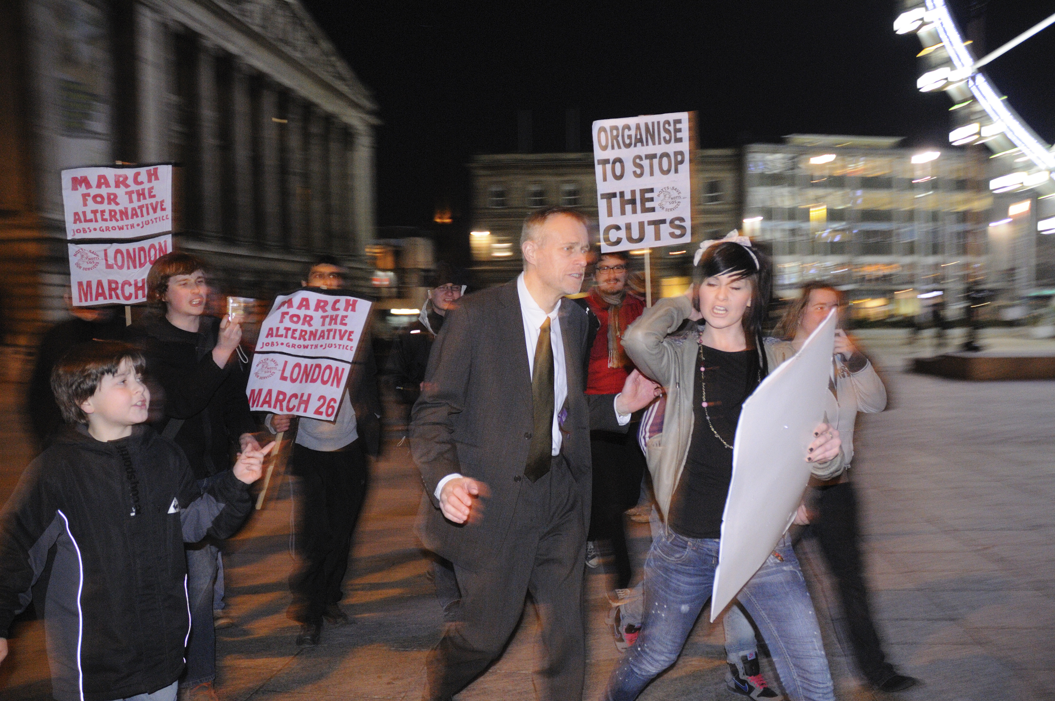 Jon Collins harangued during evening protest